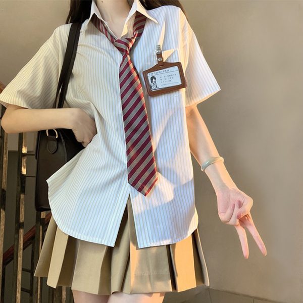 Four-Piece JK Uniform Set for Women: Striped Long Sleeve Shirt, Loose Fit, Pleated Skirt - Trendy 2024 Autumn Style