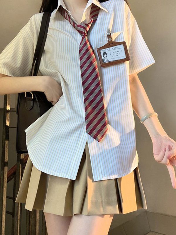 Four-Piece JK Uniform Set for Women: Striped Long Sleeve Shirt, Loose Fit, Pleated Skirt - Trendy 2024 Autumn Style
