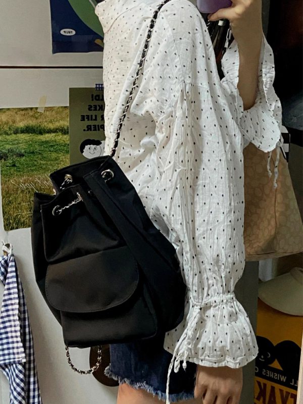Lightweight Minimalist Black Drawstring Backpack for Women - Stylish High-End Summer Commuting Bag with Chain Detail